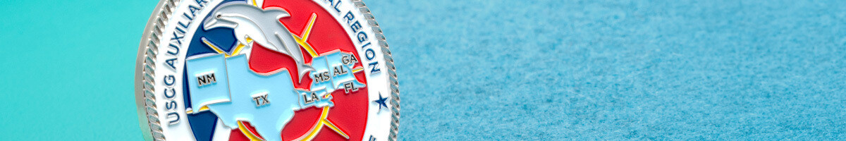 USCG Auxiliary Eighth Coastal Region challenge coin with a dolphin over a Gulf states map
