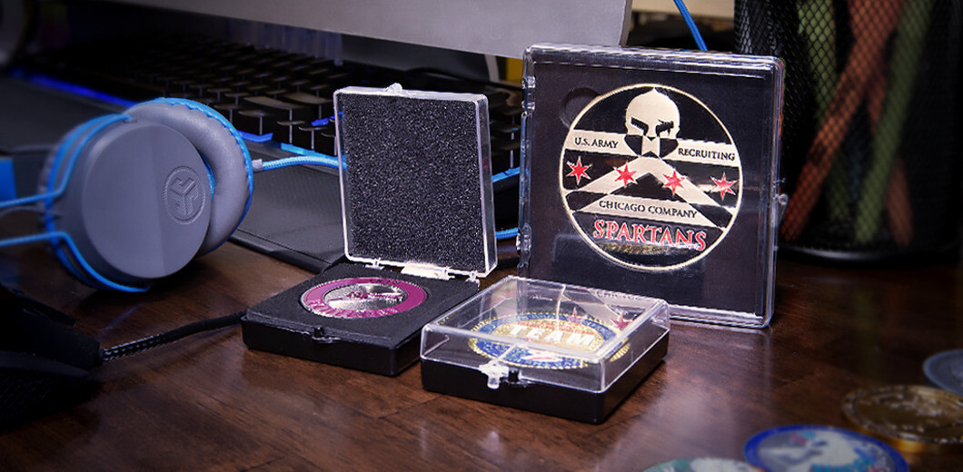 Velvet-lined acrylic display case for challenge coin presentation with hard plastic cover