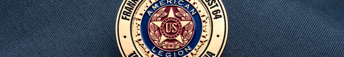 Close-up of the American Legion emblem on the Franklin Durham-Essex Post 64 coin