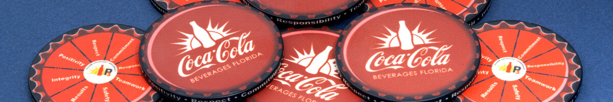 Stacks of red Coca-Cola Beverages Florida and core-values ceramic poker chips