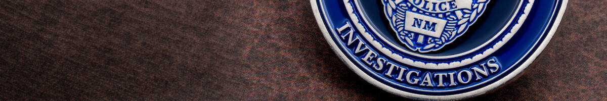 Blue and silver police Investigations division challenge coin