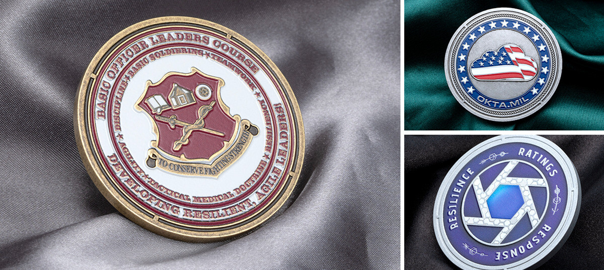 Three die struck coins with color: a maroon Basic Officer Leaders Course coin, a silver OKTA.MIL coin with an enameled US flag, and a purple Ratings Response Resilience coin
