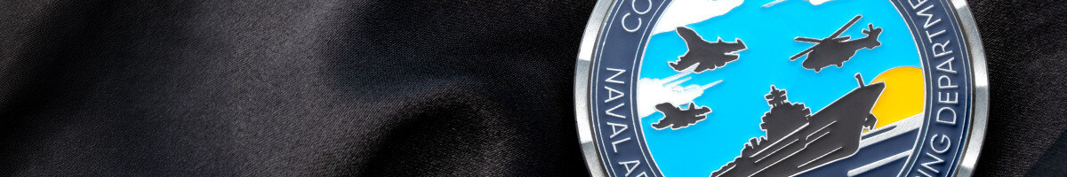 Aircraft carrier and jets on a Code 80 IT Support Navy challenge coin